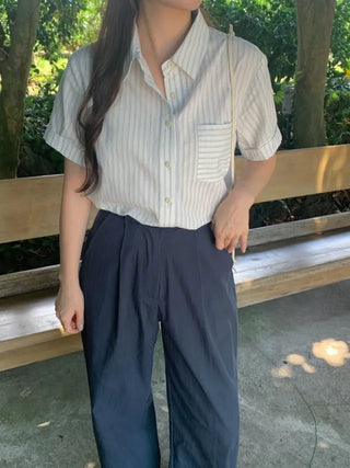 Semi-wide pleated chino pants