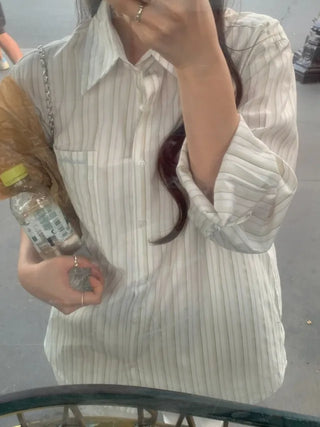 Loose-fit pocket striped shirt