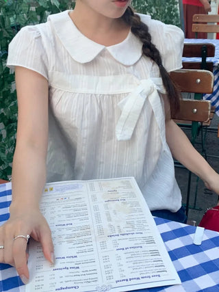 Ribbon puff shirred blouse