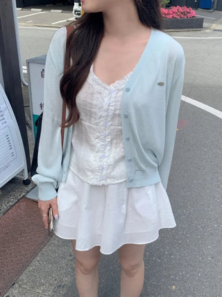 Frilled punched sleeveless layered blouse