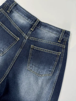 Deep blue wide denim pants with chin cutouts