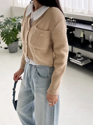 We have a waffle knit cardigan