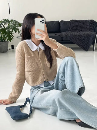 We have a waffle knit cardigan