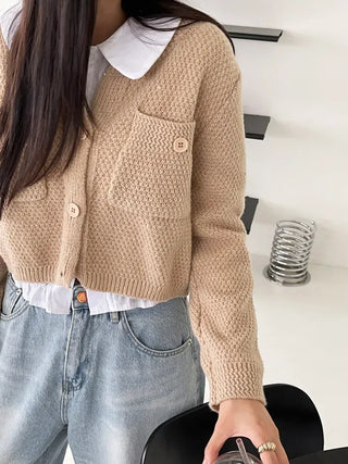 We have a waffle knit cardigan