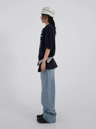 wide denim jeans with side studs