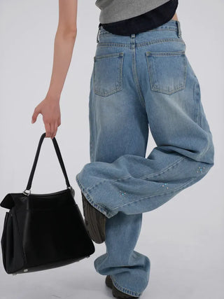 wide denim jeans with side studs