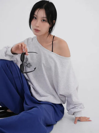 Cora Saint Graphic Off-Shoulder Sweatshirt
