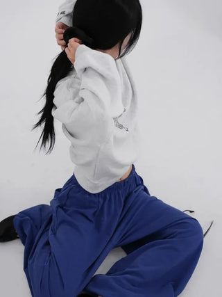 Cora Saint Graphic Off-Shoulder Sweatshirt