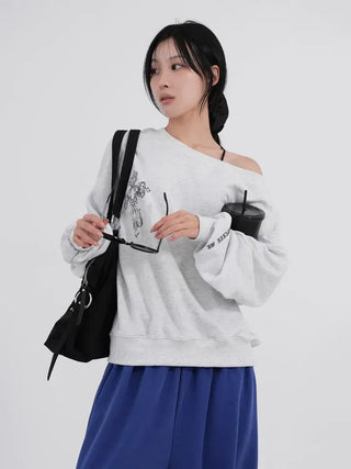 Cora Saint Graphic Off-Shoulder Sweatshirt