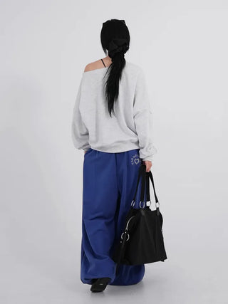 Cora Saint Graphic Off-Shoulder Sweatshirt