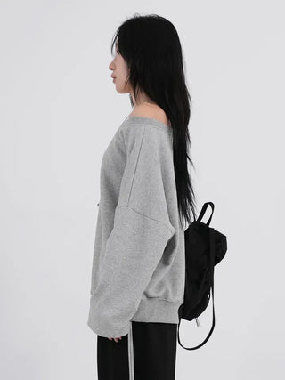 Cora Saint Graphic Off-Shoulder Sweatshirt