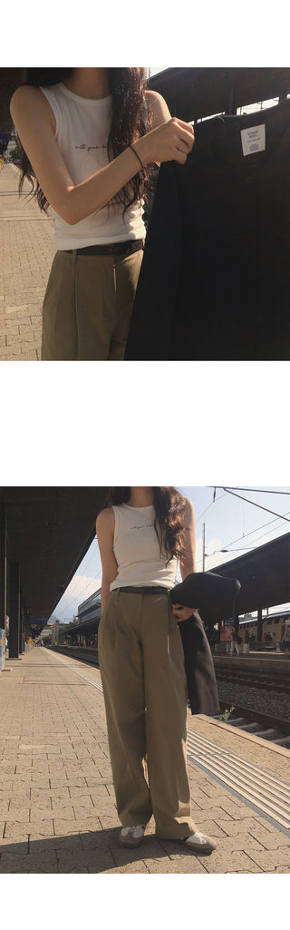 Wide cotton slacks with pleats