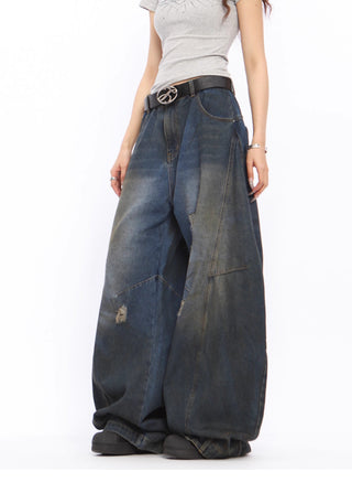 Dirty-dyed wide-leg ripped jeans