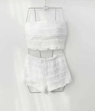 piece high-waist swimsuit set with white lace pants bikini bottoms and a tank top.