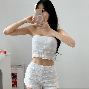 piece high-waist swimsuit set with white lace pants bikini bottoms and a tank top.