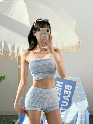 piece high-waist swimsuit set with white lace pants bikini bottoms and a tank top.