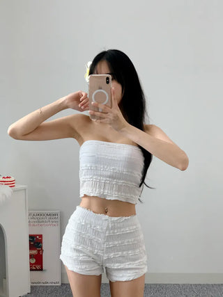 piece high-waist swimsuit set with white lace pants bikini bottoms and a tank top.