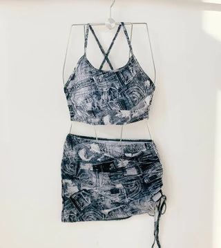 Denim printed piece bikini with shirring and body-covering swimsuit for resort vacation and water park.