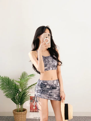 Denim printed piece bikini with shirring and body-covering swimsuit for resort vacation and water park.