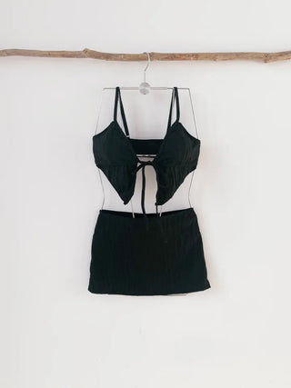 Black piece bikini with skirt and optional cap. piece swimsuit.