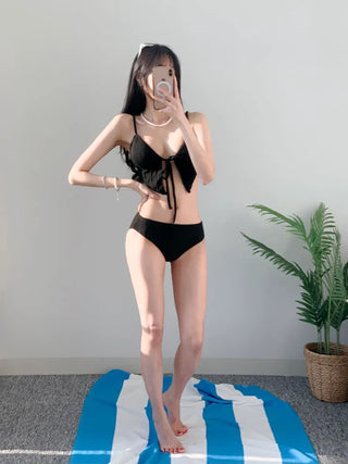 Black piece bikini with skirt and optional cap. piece swimsuit.