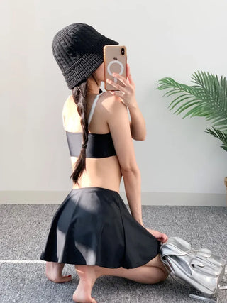 piece black top and nasi swimsuit with ribbon piece bikini skirt included