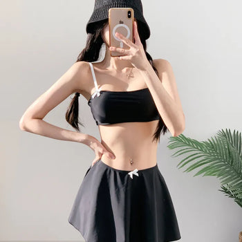 piece black top and nasi swimsuit with ribbon piece bikini skirt included