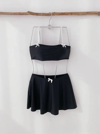 piece black top and nasi swimsuit with ribbon piece bikini skirt included
