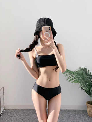 piece black top and nasi swimsuit with ribbon piece bikini skirt included