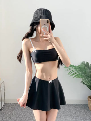 piece black top and nasi swimsuit with ribbon piece bikini skirt included