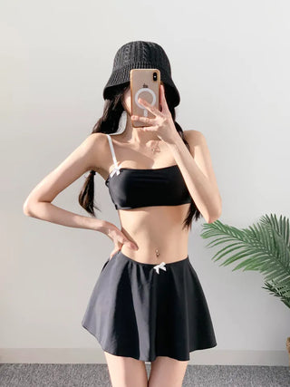 piece black top and nasi swimsuit with ribbon piece bikini skirt included