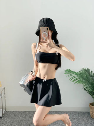 piece black top and nasi swimsuit with ribbon piece bikini skirt included