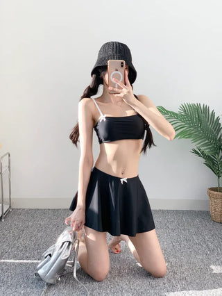 piece black top and nasi swimsuit with ribbon piece bikini skirt included