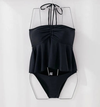 Low-rise halterneck black swimsuit bikini swimwear holiday look shirring and resort look