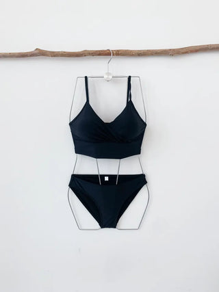 Black bikini tankini bra top with a Wangbong cap for a resort look vacation look and festival swimsuit.