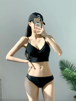 Black bikini tankini bra top with a Wangbong cap for a resort look vacation look and festival swimsuit.