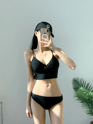 Black bikini tankini bra top with a Wangbong cap for a resort look vacation look and festival swimsuit.
