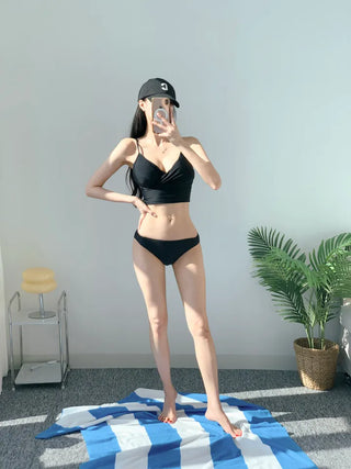 Black bikini tankini bra top with a Wangbong cap for a resort look vacation look and festival swimsuit.
