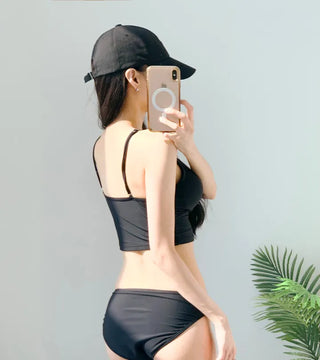Black bikini tankini bra top with a Wangbong cap for a resort look vacation look and festival swimsuit.