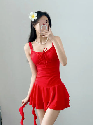 One-piece swimsuit with red frills ribbon and red beach vacation swimsuit