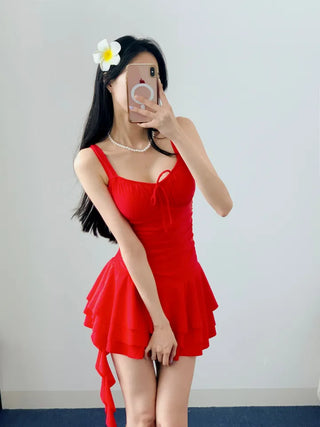 One-piece swimsuit with red frills ribbon and red beach vacation swimsuit