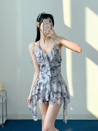 Gray halter neck frill one-piece swimsuit with floral pattern and underpants for a resort look and vacation look.