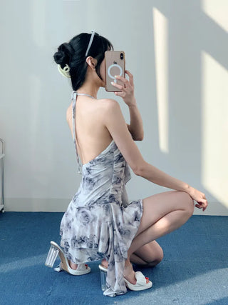 Gray halter neck frill one-piece swimsuit with floral pattern and underpants for a resort look and vacation look.