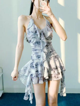 Gray halter neck frill one-piece swimsuit with floral pattern and underpants for a resort look and vacation look.