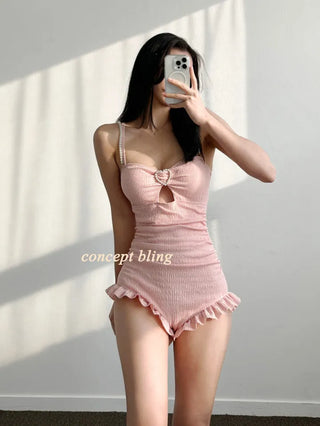 Pink monokini one-piece swimsuit with heart pearl jewel string frill shirring belly cover flab cover resort vacation