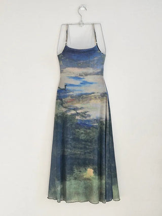 Resort long one-piece dress with a body-shaping slip straps a loose fit and a lining for a travel look or a vacation look. A silky fit and tie-dye one-piece dress for summer.
