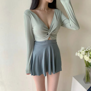 twist pastel long sleeve ballet core one-piece swimsuit