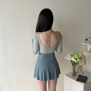 twist pastel long sleeve ballet core one-piece swimsuit
