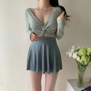 twist pastel long sleeve ballet core one-piece swimsuit