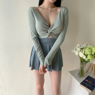 twist pastel long sleeve ballet core one-piece swimsuit